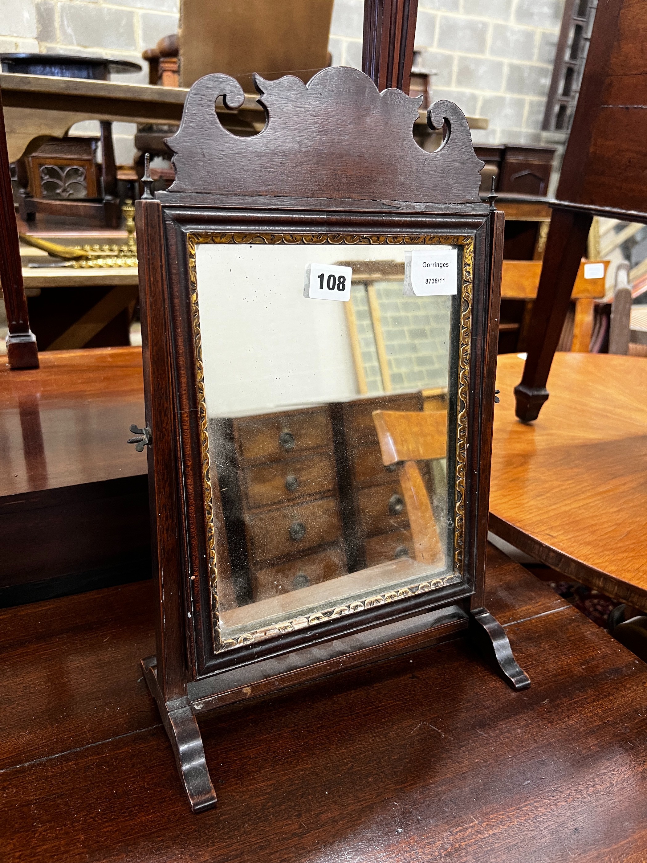 A George III mahogany swing frame toilet mirror, height 43cm